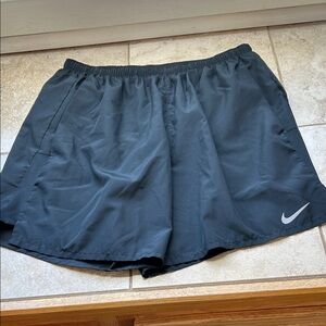 Nike Dark Gray Running Shorts with White Swoosh
